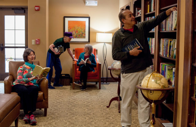 Residents Reading in the Library