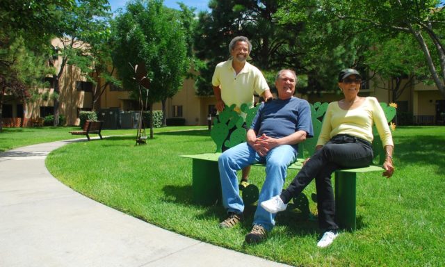 Residents on Bench in Lawn