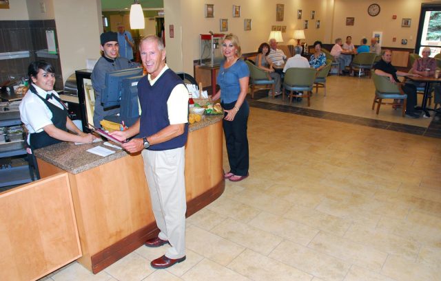 Staff Serving Residents at Counter