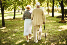 Elderly couple walking in the park
